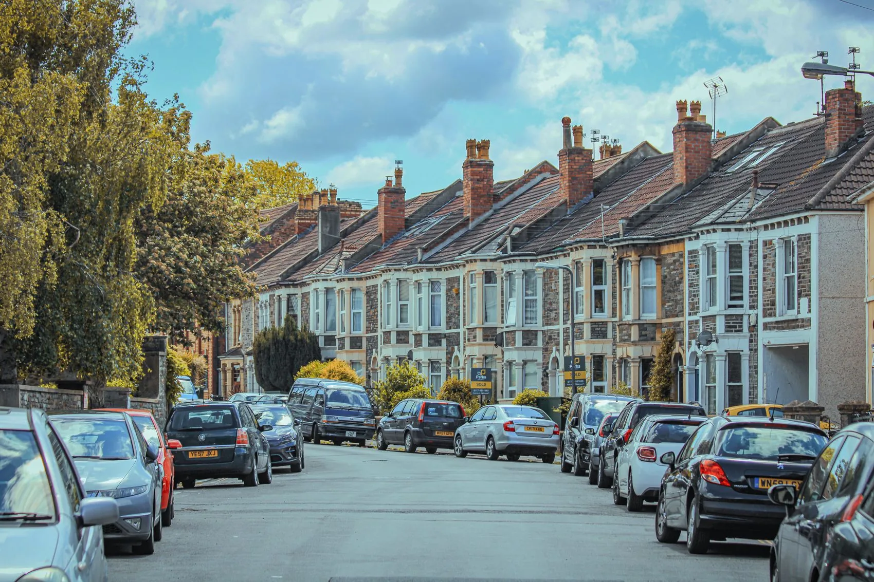 A street of Victorian terraced houses on a sunny day
