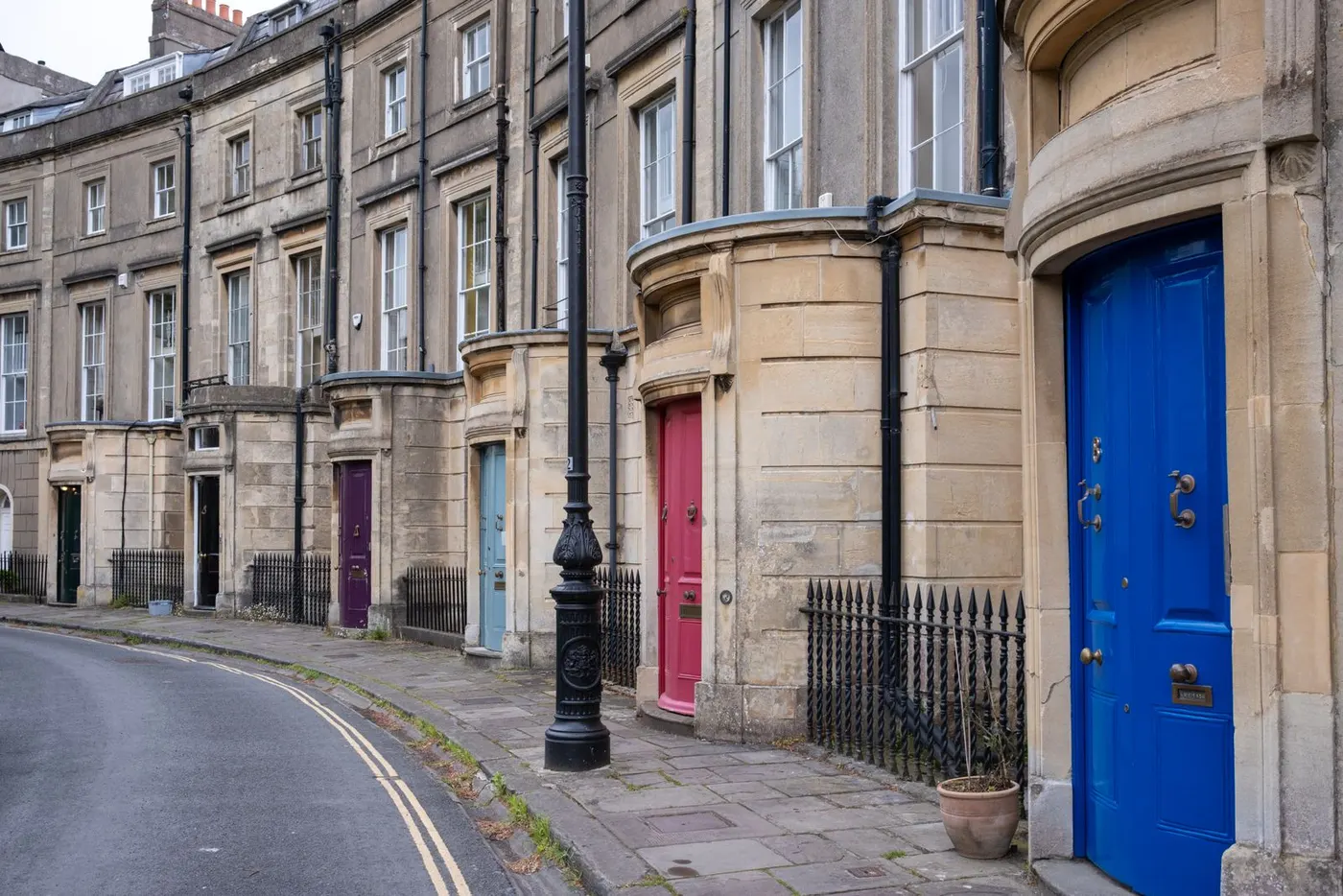 Georgian stone houses with coloured front doors